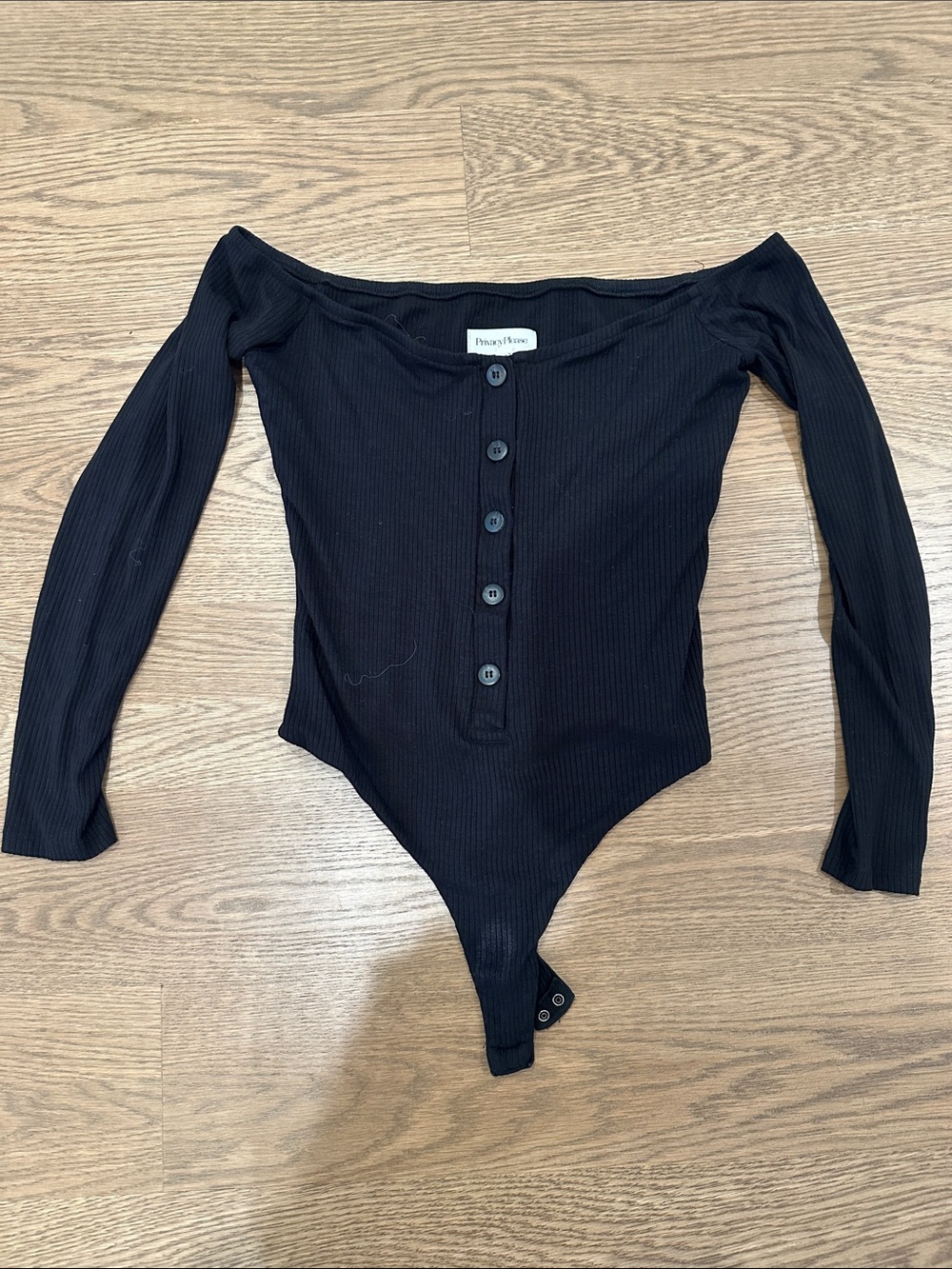 Privacy Please Black Off-Shoulder Ribbed Long-Sleeve Button Bodysuit